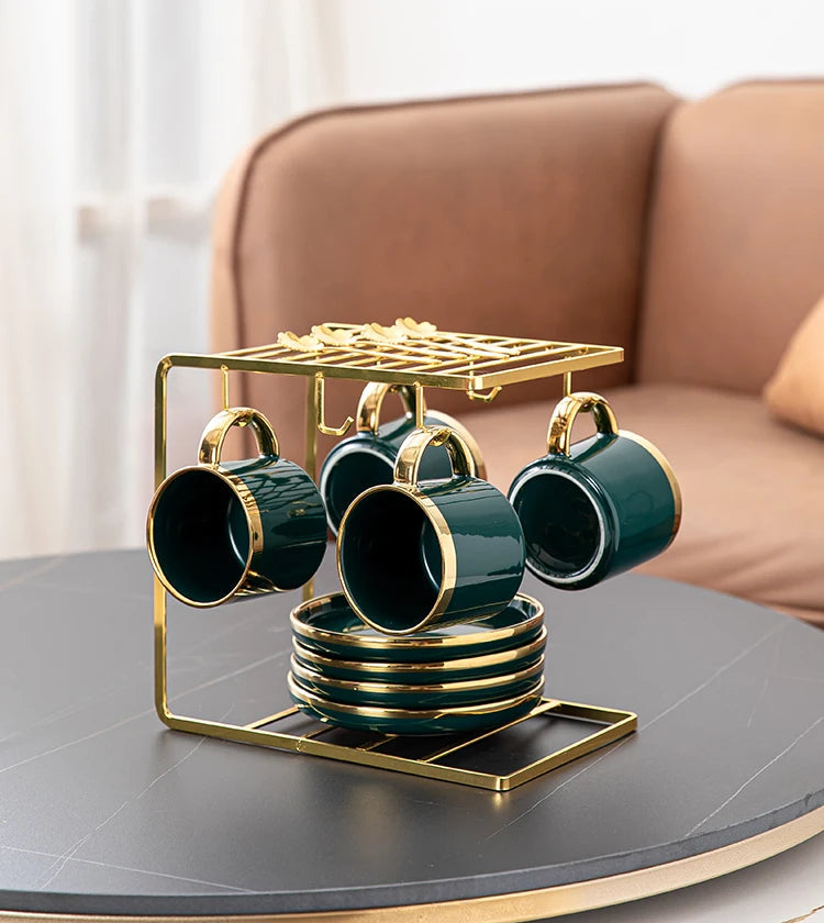 European-style ceramic coffee cup and saucer set with a light luxury design, displayed on a stylish kitchen storage rack.