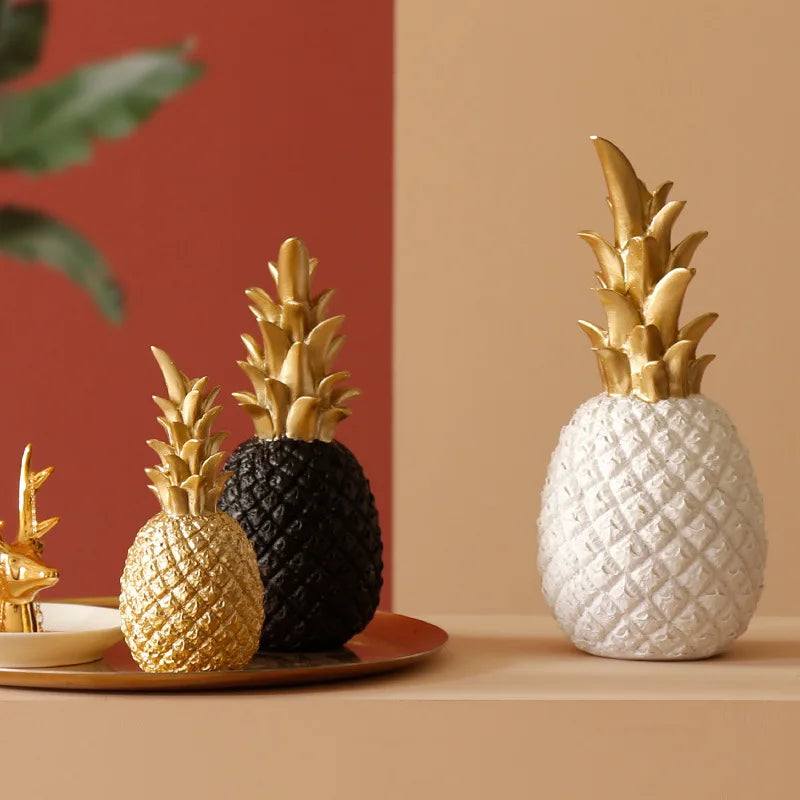 Golden ceramic pineapple home decor by MC THE BLACK DIAMOND, decorative soft ornament for living rooms, porches, or weddings.