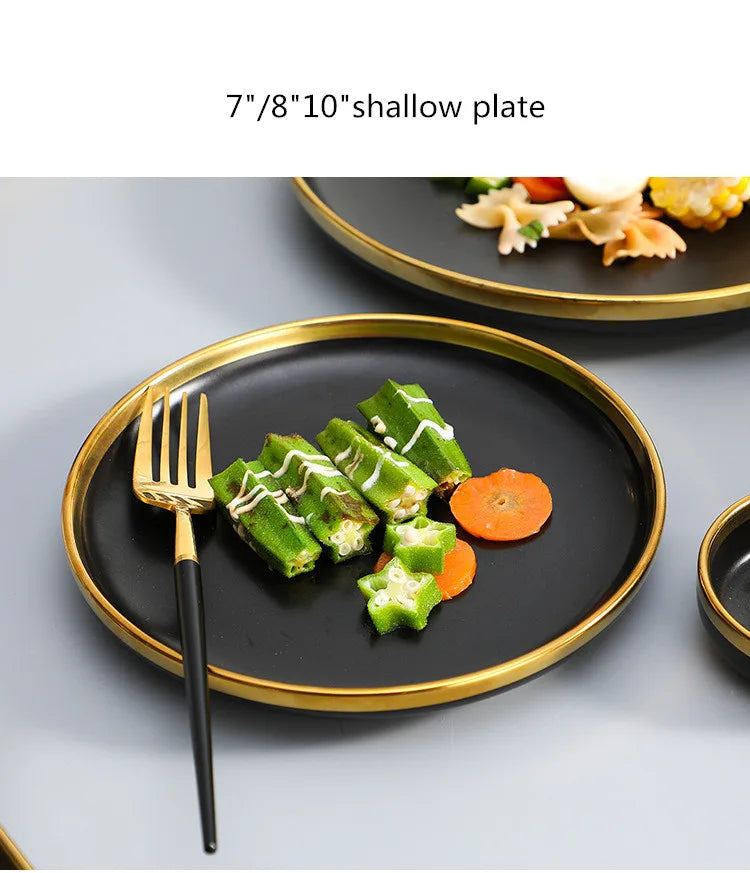 Set of matte gold inlay black porcelain dinnerware by MC THE BLACK DIAMOND, including dinner plates, bowls, and serving pieces.