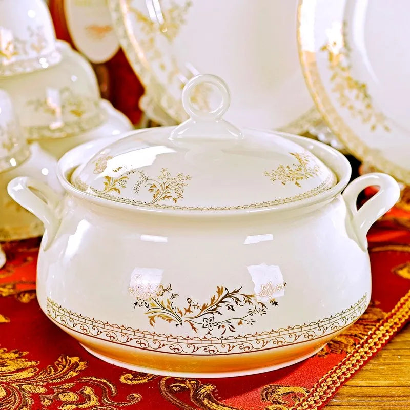 Kitchen 56-piece dinnerware set by MC The Black Diamonds featuring plates, bowls, and cups arranged on a table.