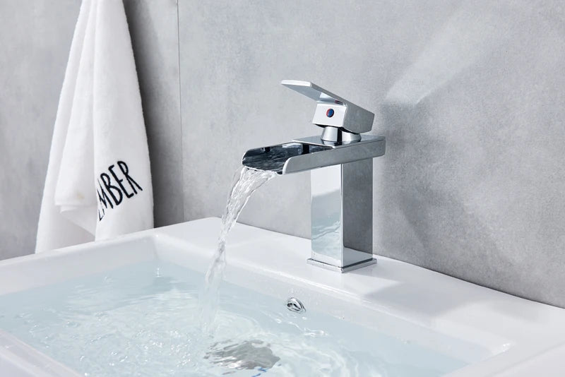 Black waterfall bathroom faucet with basin vanity vessel sink by MC THE BLACK DIAMOND, modern bath fixture with sleek design.