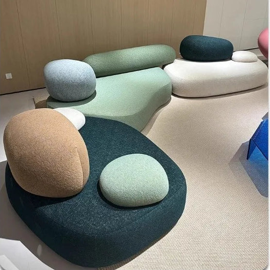 Luxury MC THE BLACK DIAMOND sofa in pebble fabric with a unique shape, designed for living room comfort and modern style.