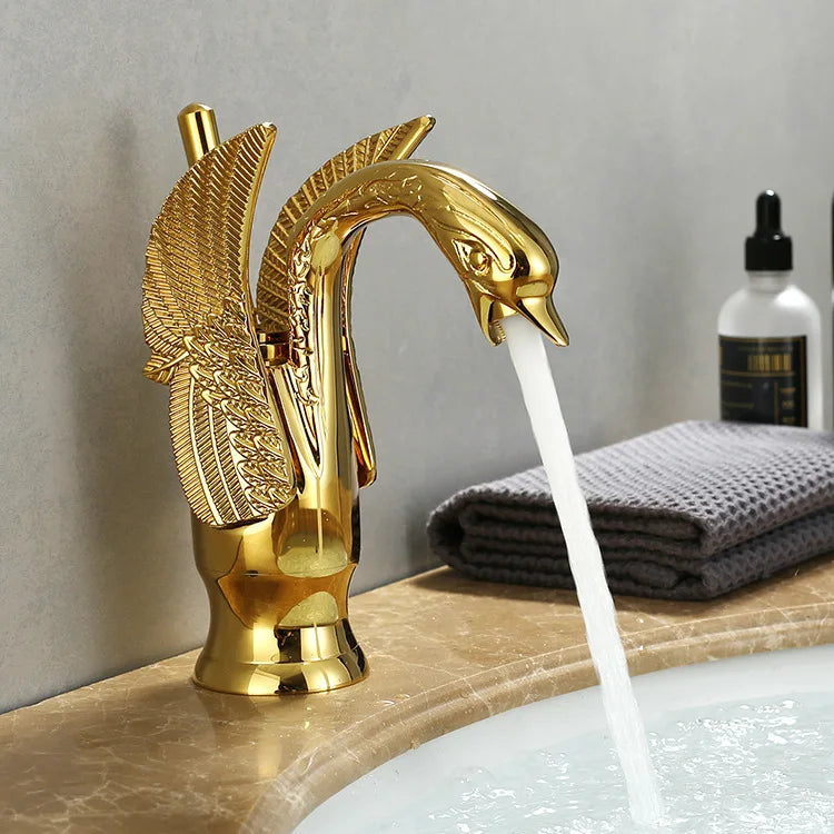 MC THE BLACK DIAMOND golden basin faucet with swan-shaped design, single handle, deck mount hot and cold water sink tap.