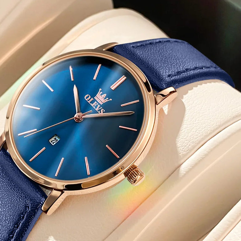 OLEVS minimalist ladies' watch with leather strap, waterproof quartz movement, and calendar display, from Mohamad Collection.