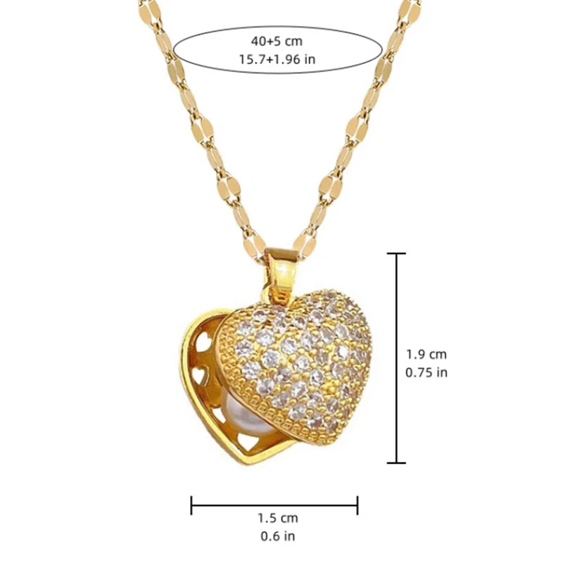 Gold stainless steel ZAKOL French shell pearl necklace with love heart charm, perfect for womenโs wedding or special occasion jewelry.