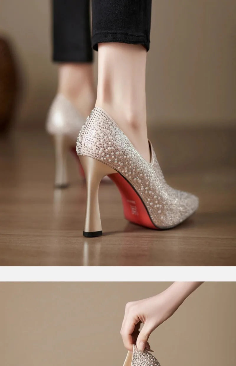 Elegant rhinestone high heels by Mohammad Collection with pointed toes, pearls, and crystals, perfect for wedding or bridal occasions.
