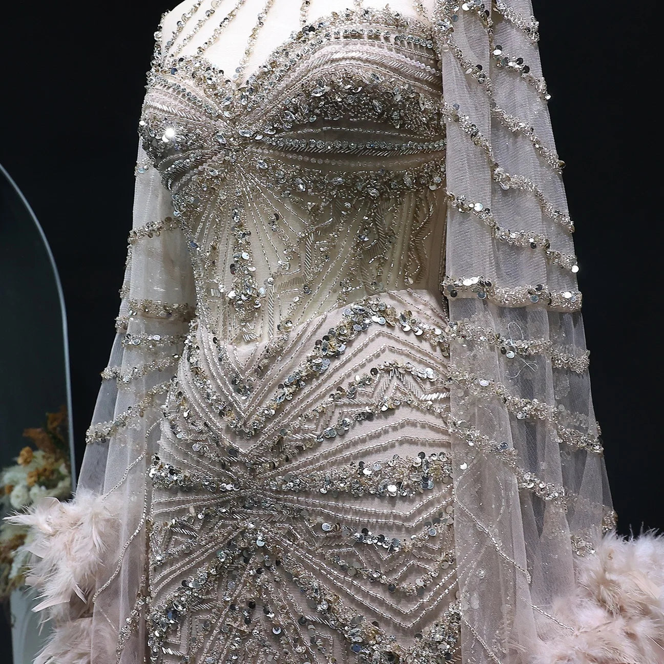 MC THE BLACK DIAMOND caramel beaded mermaid evening dress with feather cape sleeves for formal weddings and parties.