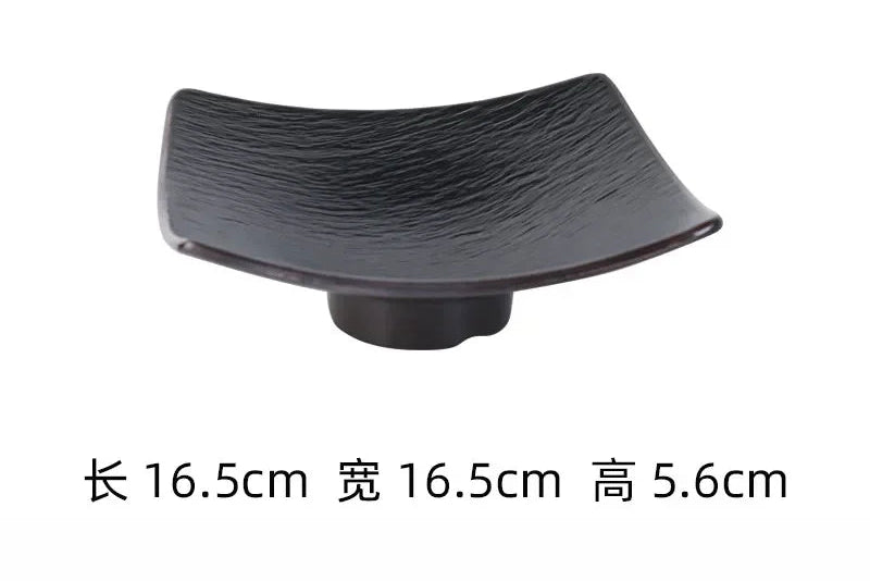 Black frosted melamine dinner plate from Mc The Black Diamonds, ideal for Japanese sushi, snacks, and fruit dishes in a hotpot restaurant.