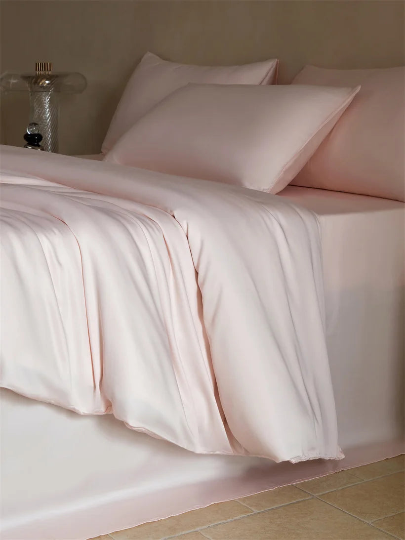 Luxurious MC Collection 100% Mulberry Silk Bedding Set featuring smooth silk sheets and pillowcases in elegant home decor style.
