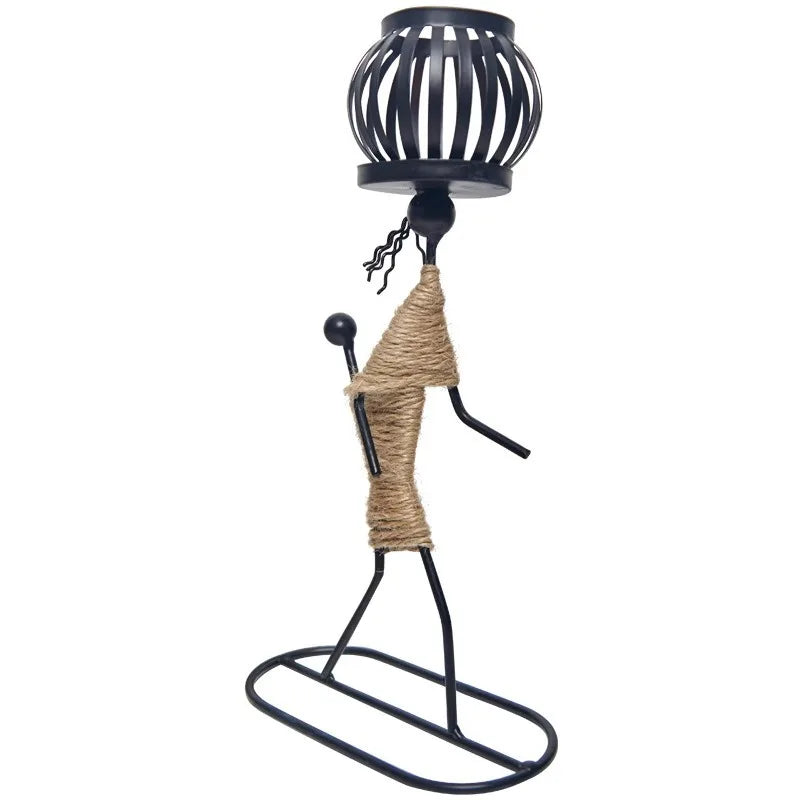 Nordic metal candlestick with abstract character sculpture, handmade candle holder by ๐๐ ๐๐๐ ๐น๐๐๐๐ ๐ป๐๐๐