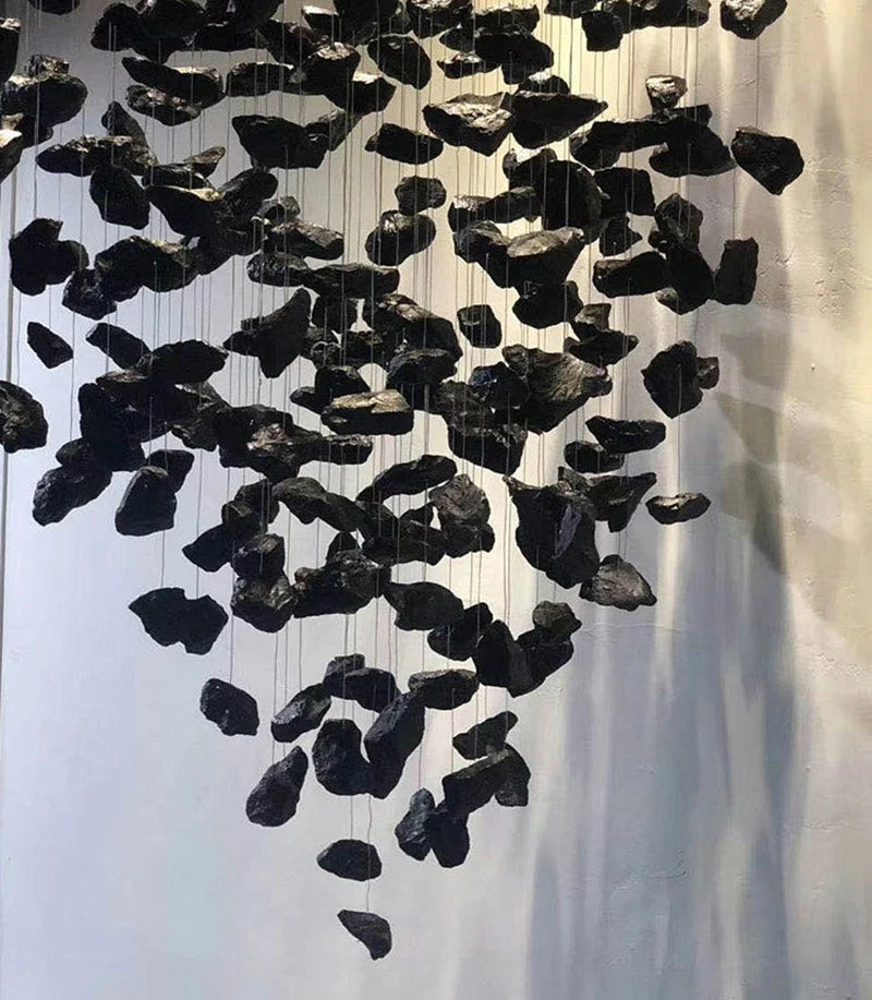 Black Art Luxury Stone Crystal Chandelier by MC THE BLACK DIAMOND hanging in a modern staircase hallway with LED crystal lights