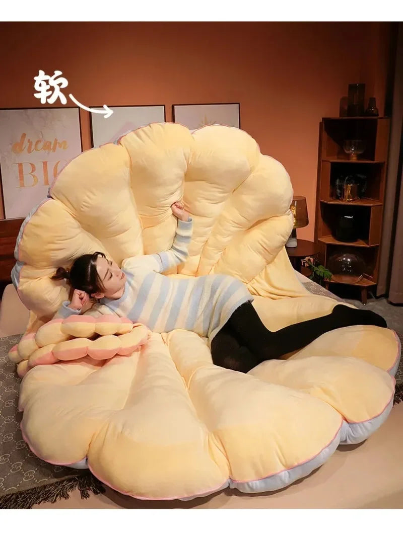 Large clamshell cushion plush pillow by MC The Black Diamond, shaped like a seashell, perfect for kid beds and cozy seating.