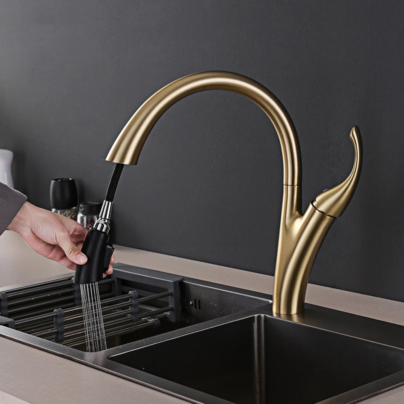 Modern black brass kitchen faucet with single handle, pull-out spray, hot and cold water, sleek design by MC THE BLACK DIAMOND