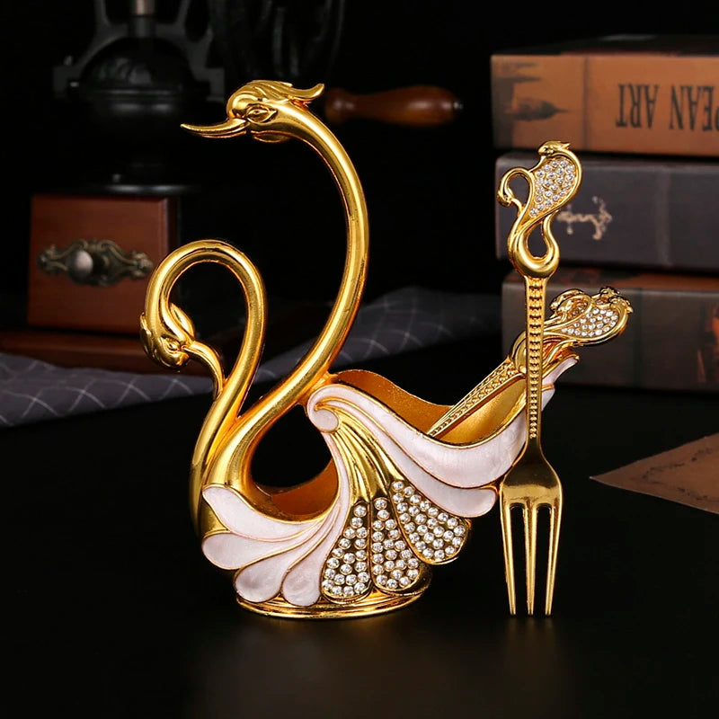 Swan-shaped fruit fork and spoon set by ๐๐ ๐๐๐ ๐น๐๐๐๐ ๐ป๐๐๐๐ ๏ฟฝ