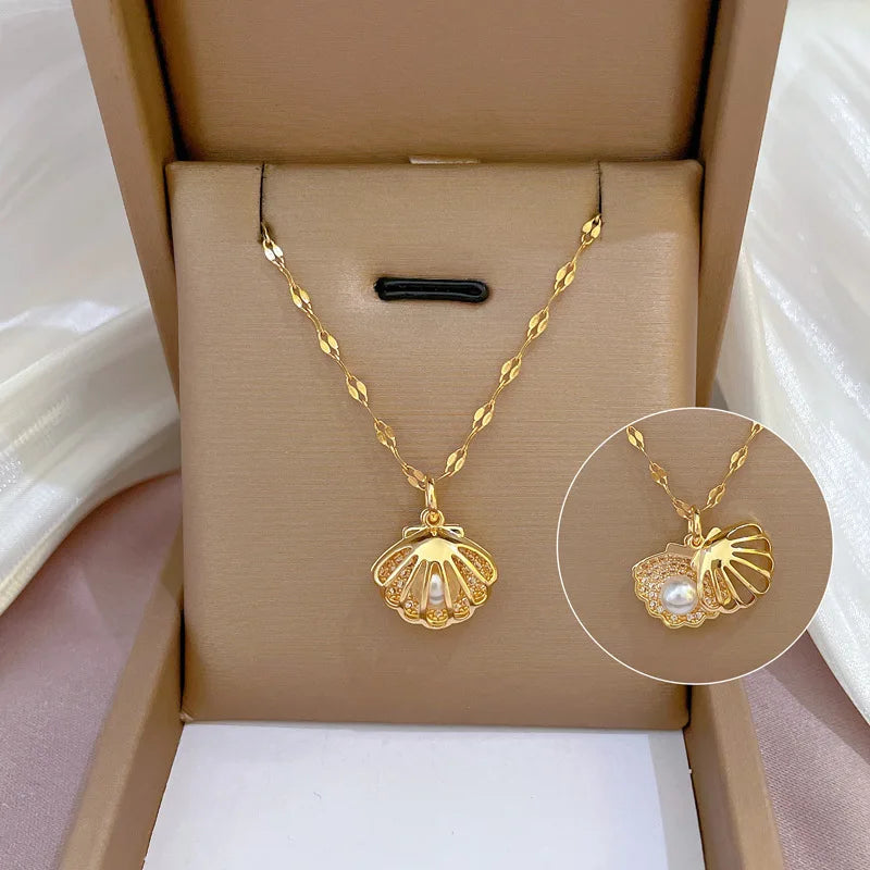 Gold ZAKOL French shell pearl necklace with zircon love heart charm, stainless steel choker for women, wedding jewelry.