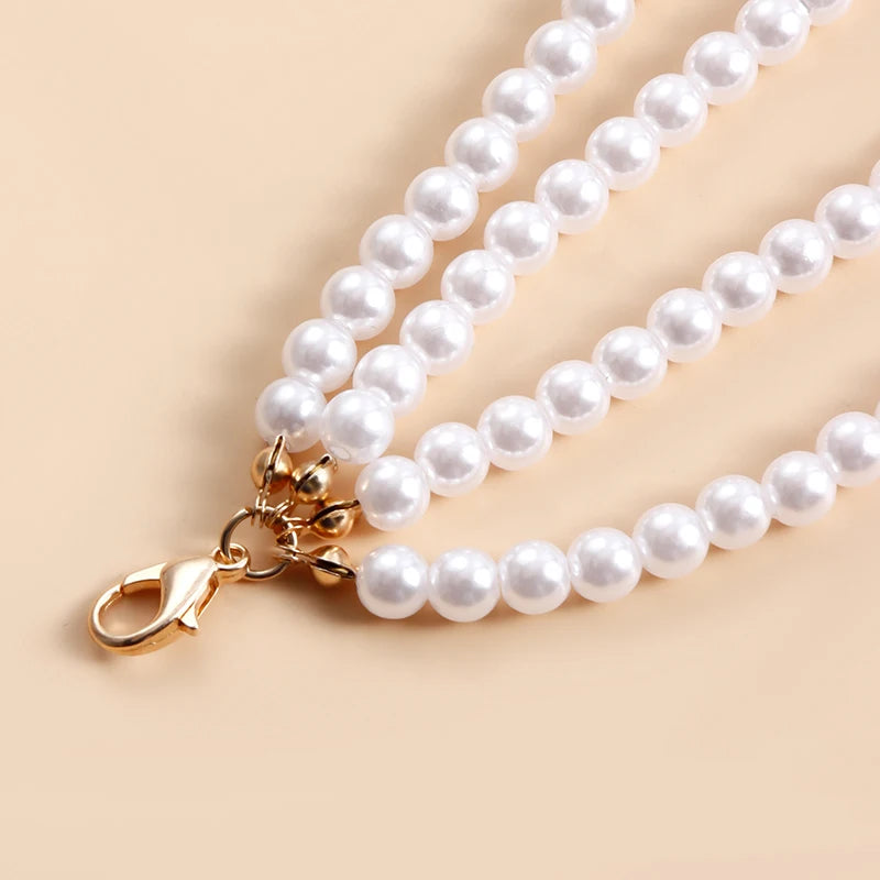 Multilayer pearl waist chain for women featuring imitation pearls, metal rings, and tassel accents, stylish body jewelry by šš ššš š¹šššš ļæ½