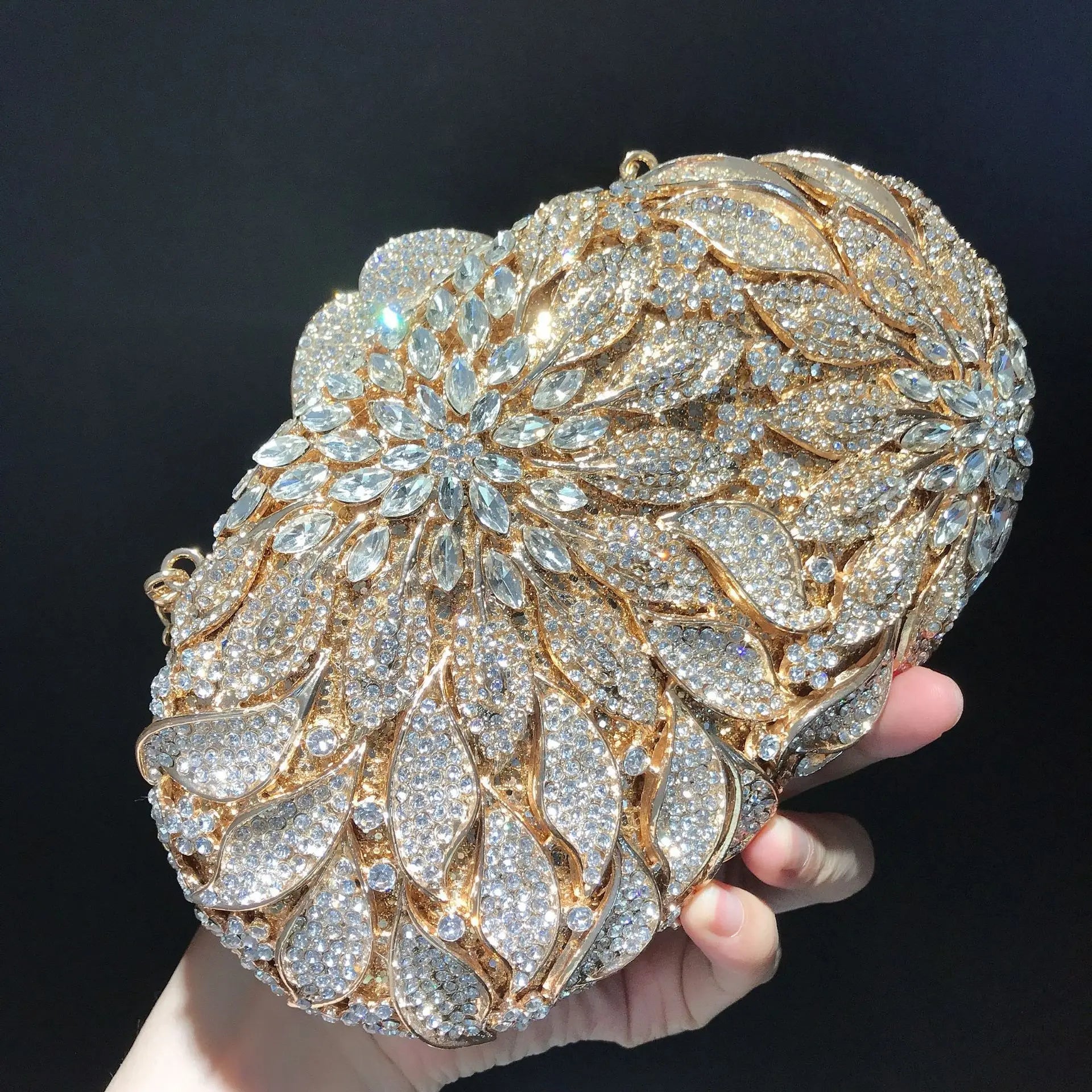 Gold metal leaves and white crystal evening clutch bag by MC THE BLACK DIAMOND, luxury mini heart-shaped handbag for women’s parties