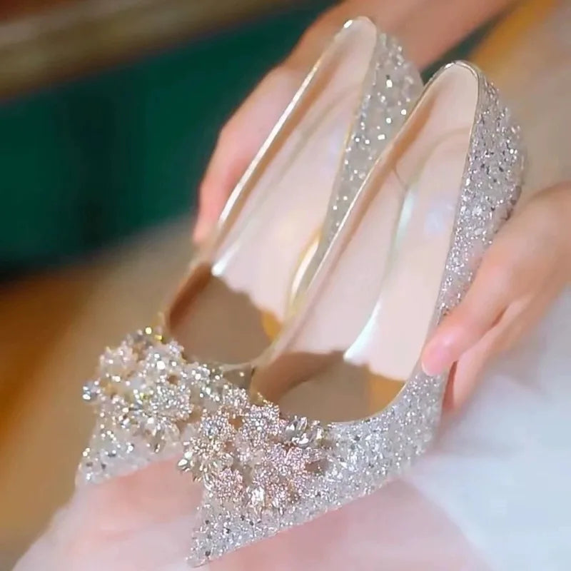Women's high heel shoes by Mohammad Collection featuring elegant crystal adornments, pointed toe, and a retro banquet party style.