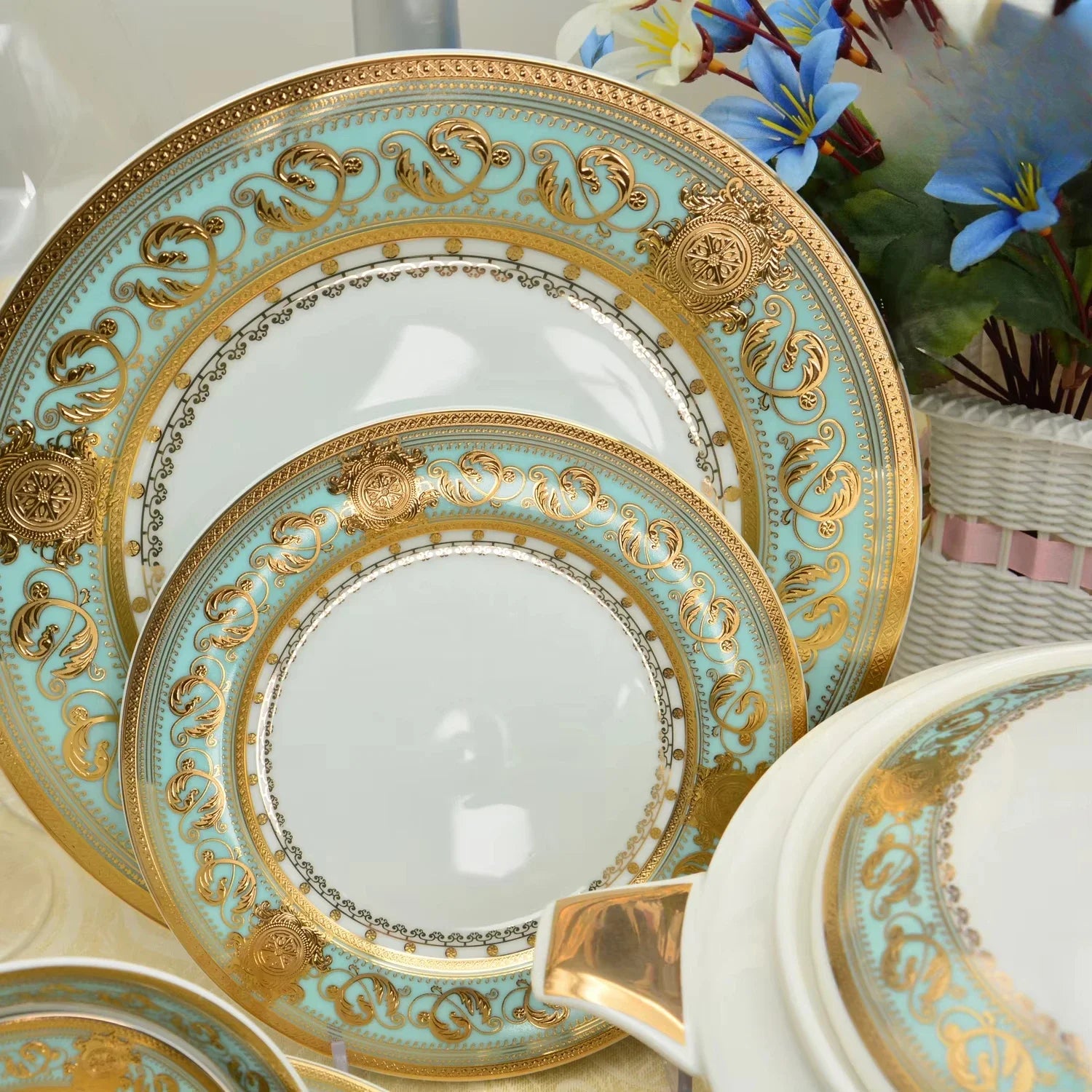 Embossed gold porcelain dinnerware set by MC THE BLACK DIAMOND, luxury bone china tableware for elegant dining.