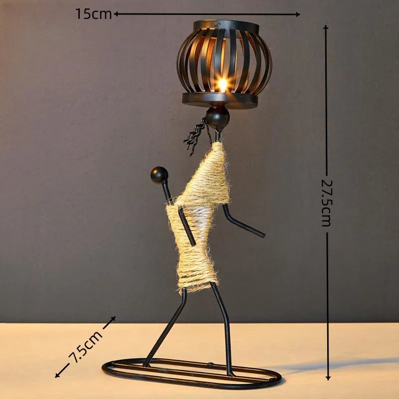 Nordic metal candle holder with abstract character sculpture, handmade figurine for home decor, designed by ๐๐ฎ ๐๐๐ ๐น๐๐๐๐ ๐ป๐๏ฟฝ