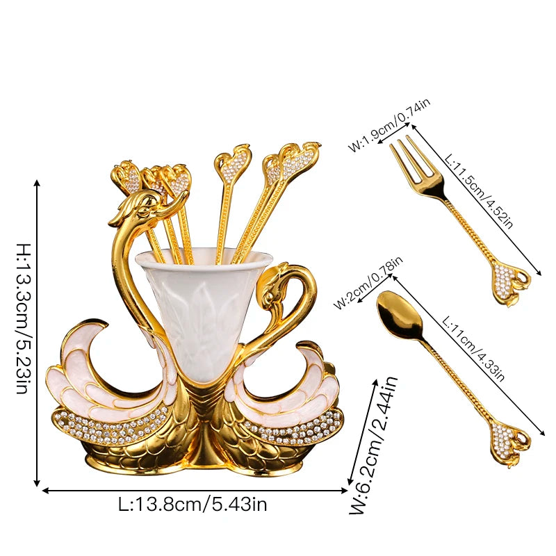 Swan-shaped fruit fork and spoon set from ๐๐ ๐๐๐ ๐น๐๐๐๐ ๐ป๐๐๐๐ ๏ฟฝ