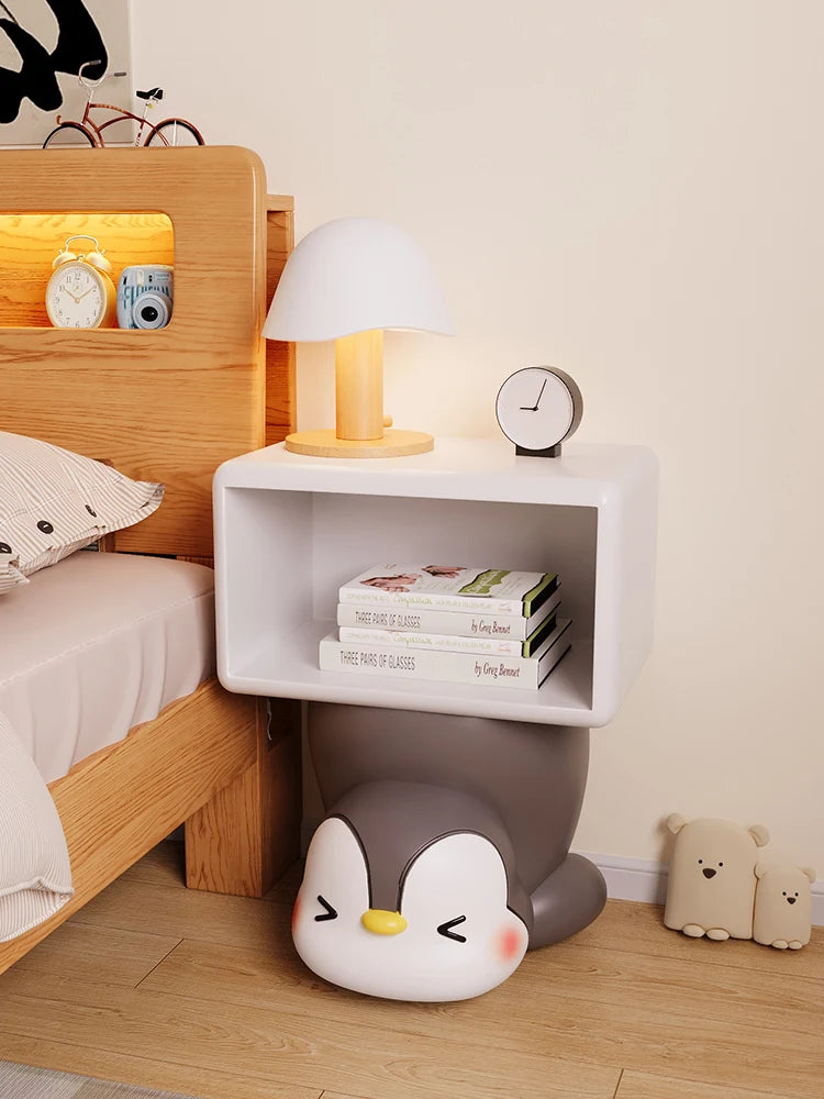 Children's bedroom nightstand by MC The Black Diamond, wooden table with drawers for kids' room storage.