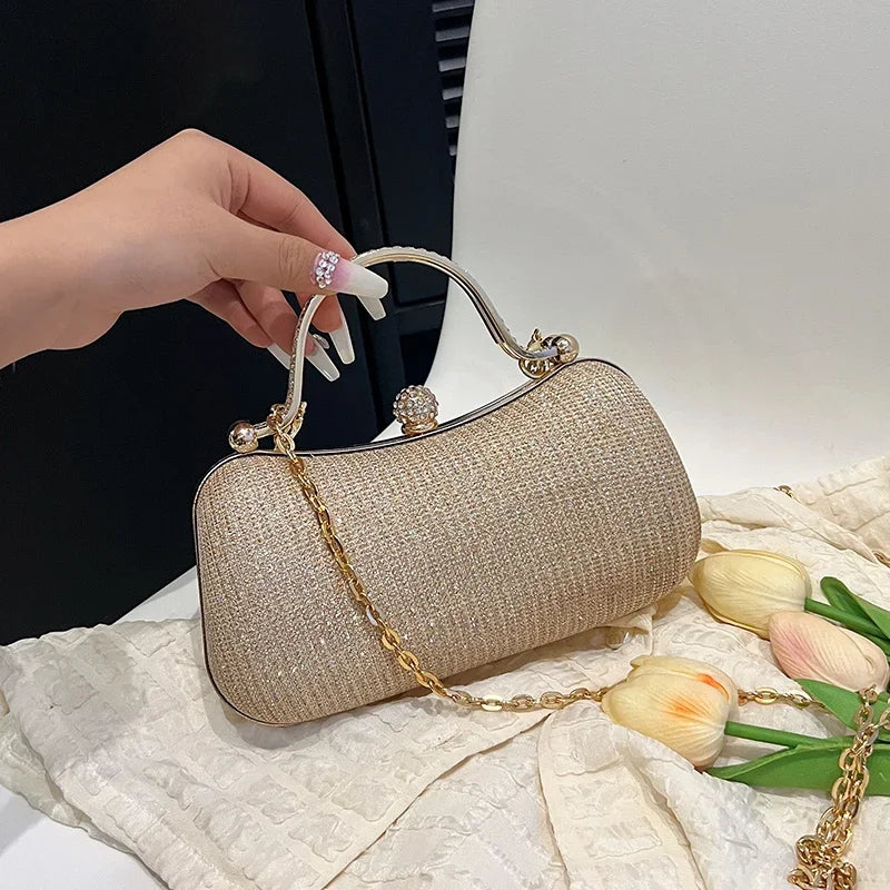 MC THE BLACK DIAMOND chain evening shoulder bag, elegant women's dinner hand bag with a sleek design and chain strap.