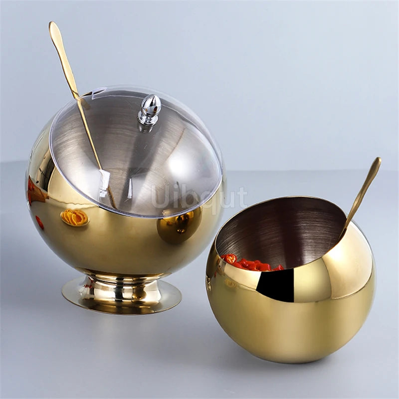 Stainless steel oblique-mouthed sauce bowl with lid, suitable for hot pots, salads, and seasoning in a modern kitchen setting.