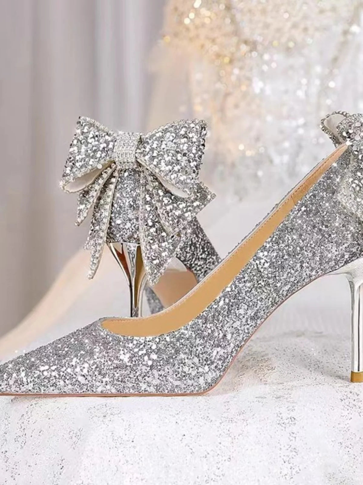 Silver crystal soft leather high heels slip-on shoes by Mohammad Collection with pointed toes for womenโs wedding and banquet events.