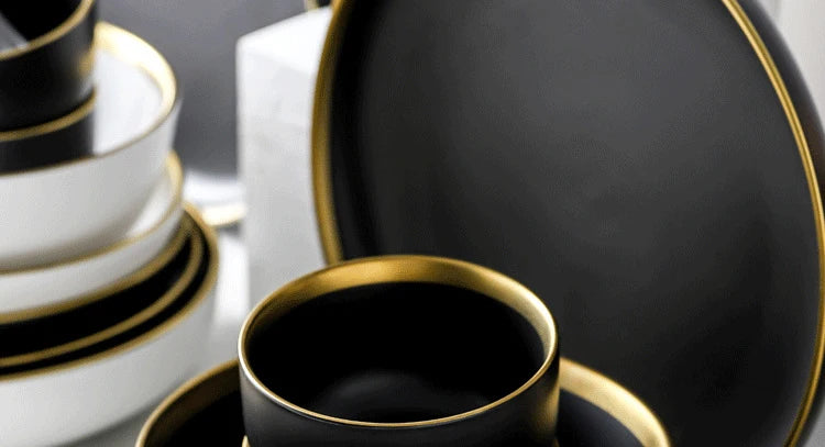 Black and white matte porcelain dinner plate from MC THE BLACK DIAMOND, ideal for modern kitchen table settings.