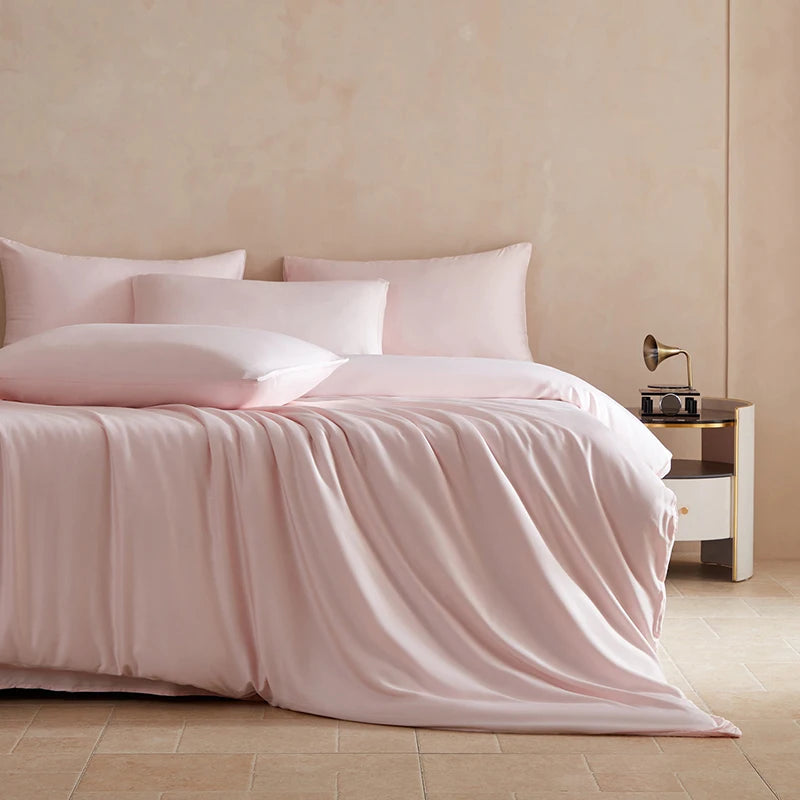 Luxurious MC Collection 100% Mulberry Silk Bedding Set featuring smooth silk pillows and duvet covers for elegant home decor.