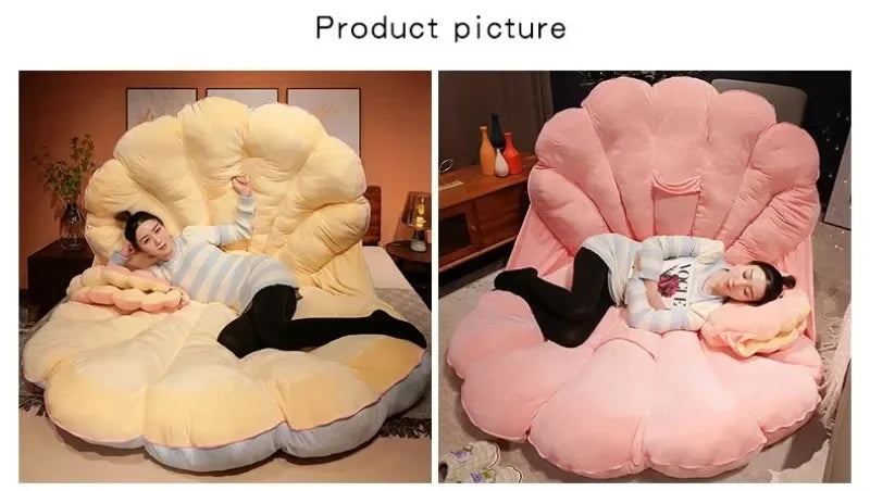 Large clam shell-shaped plush cushion from MC The Black Diamond, perfect as a seashell sofa pillow or kid bed accessory.