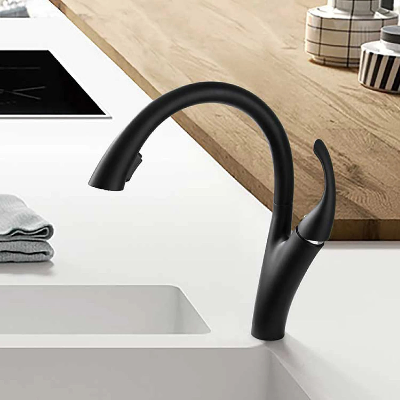Modern black brass kitchen faucet with single handle, pull-out spout, hot and cold water, sleek simple design by MC THE BLACK DIAMOND