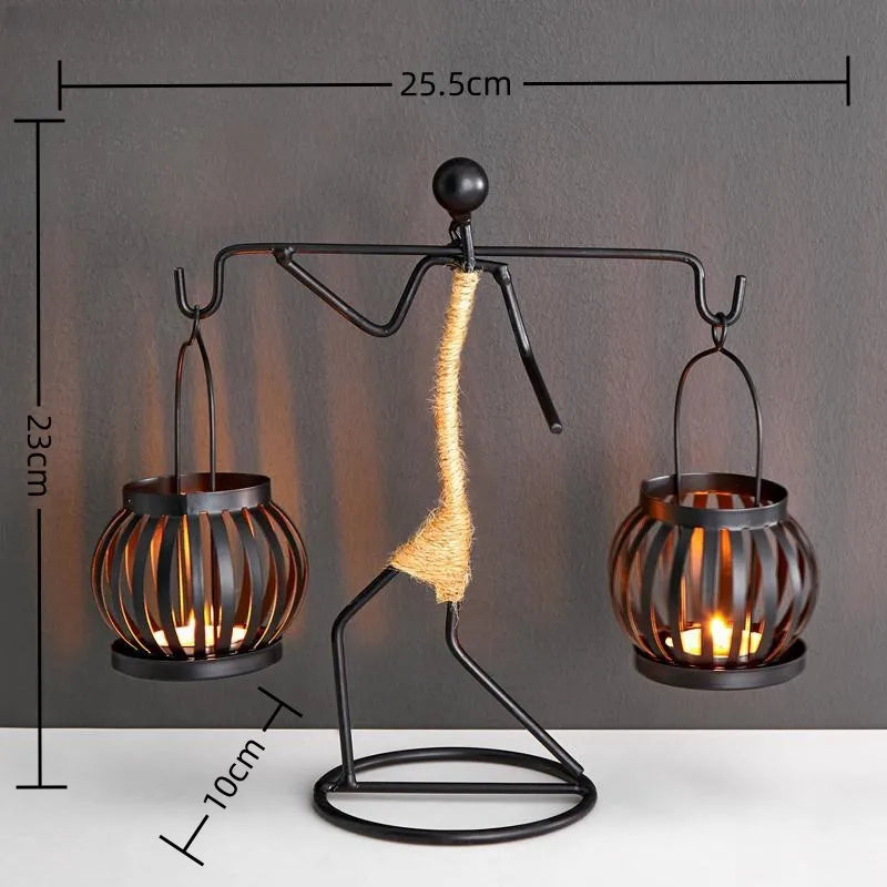 Nordic metal candle holder sculpture featuring abstract character design by ๐๐ ๐๐๐ ๐น๐๐๐๐ ๐ป๐๐๐๐