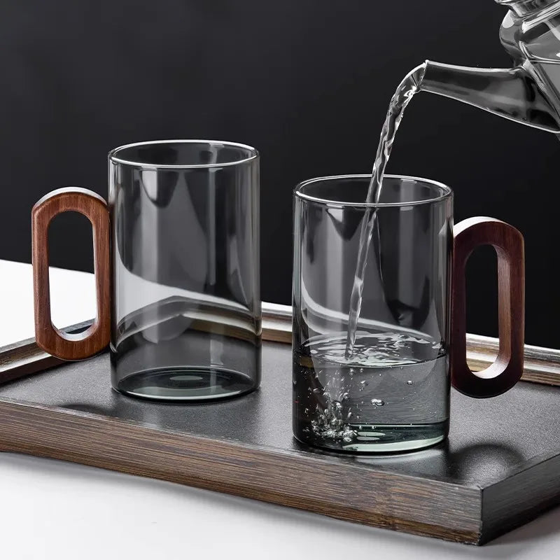 Glass mug with wooden handle from 𝕄𝕔 𝕋𝕙𝕖 𝔹𝕝𝕒𝕔𝕜 𝔻𝕚𝕒𝕞𝕠𝕟�