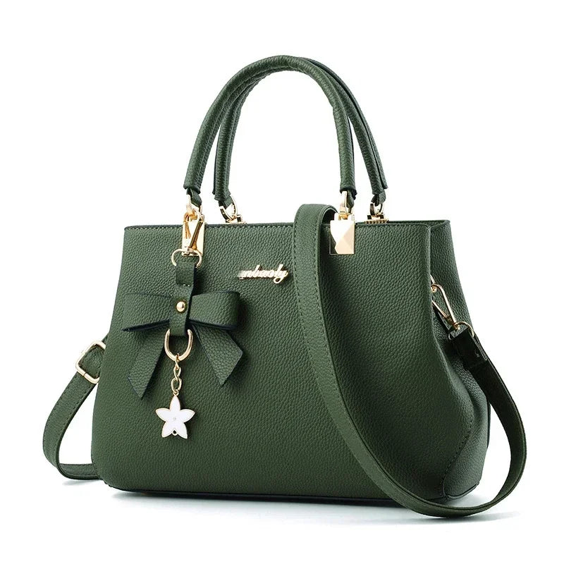 Women messenger handbag with flower pendant, crossbody shoulder bag by 𝕄𝕔 𝕋𝕙𝕖 𝔹𝕝𝕒𝕔𝕜 𝔻𝕚𝕒𝕞�