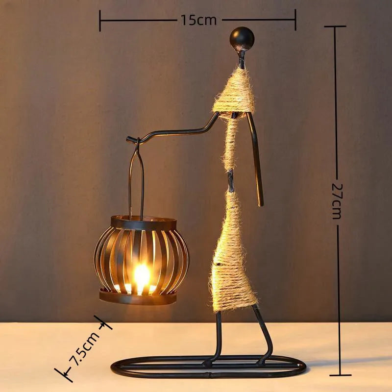 Nordic metal candle holder featuring abstract character sculpture, handmade decorative figurine from MC The Black Diamond.