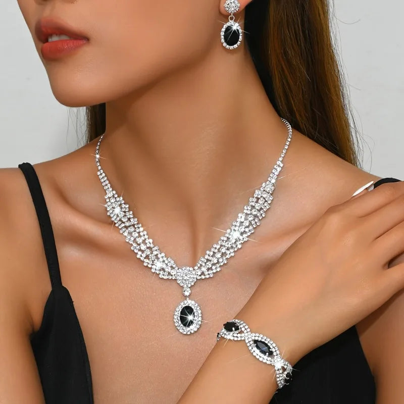 Elegant bridal jewelry set featuring a necklace and earrings with sparkling rhinestones by šš ššš š¹šššš š»ššš