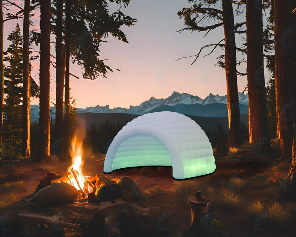 MC THE BLACK DIAMOND inflatable igloo dome tent set up outdoors, showcasing its pop-up design and durable air-filled structure.