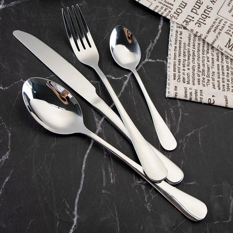 24-piece stainless steel cutlery set including knives, forks, and spoons from 𝕄𝕔 𝕋𝕙𝕖 𝔹𝕝𝕒𝕔𝕜 𝔻𝕚𝕒�
