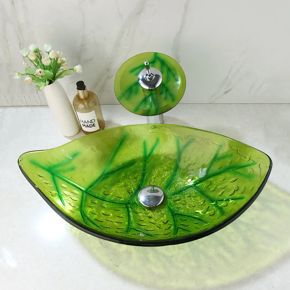Green leaf-shaped vessel sink by MC THE BLACK DIAMOND, modern bathroom wash basin with botanical-inspired design.