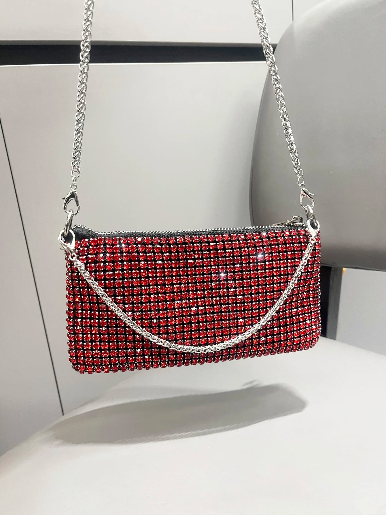 Luxury MC THE BLACK DIAMOND rhinestone clutch purse for women, elegant handle and shoulder bag with sparkling embellishments.