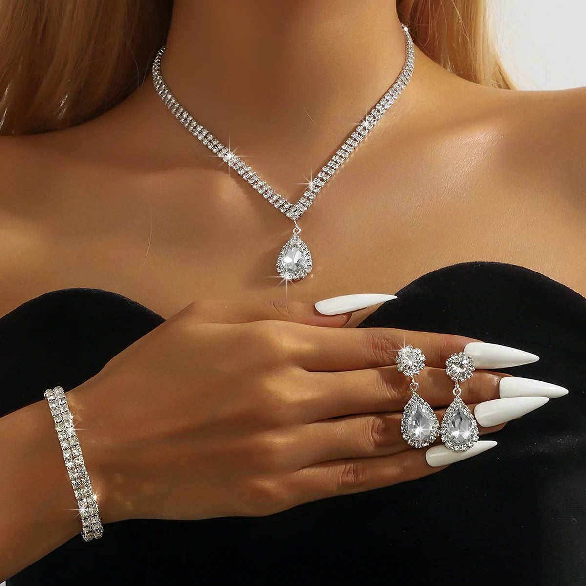 Wedding Season women's jewelry set with copper claw chain water drop necklace, earrings, and bracelet for special occasions.