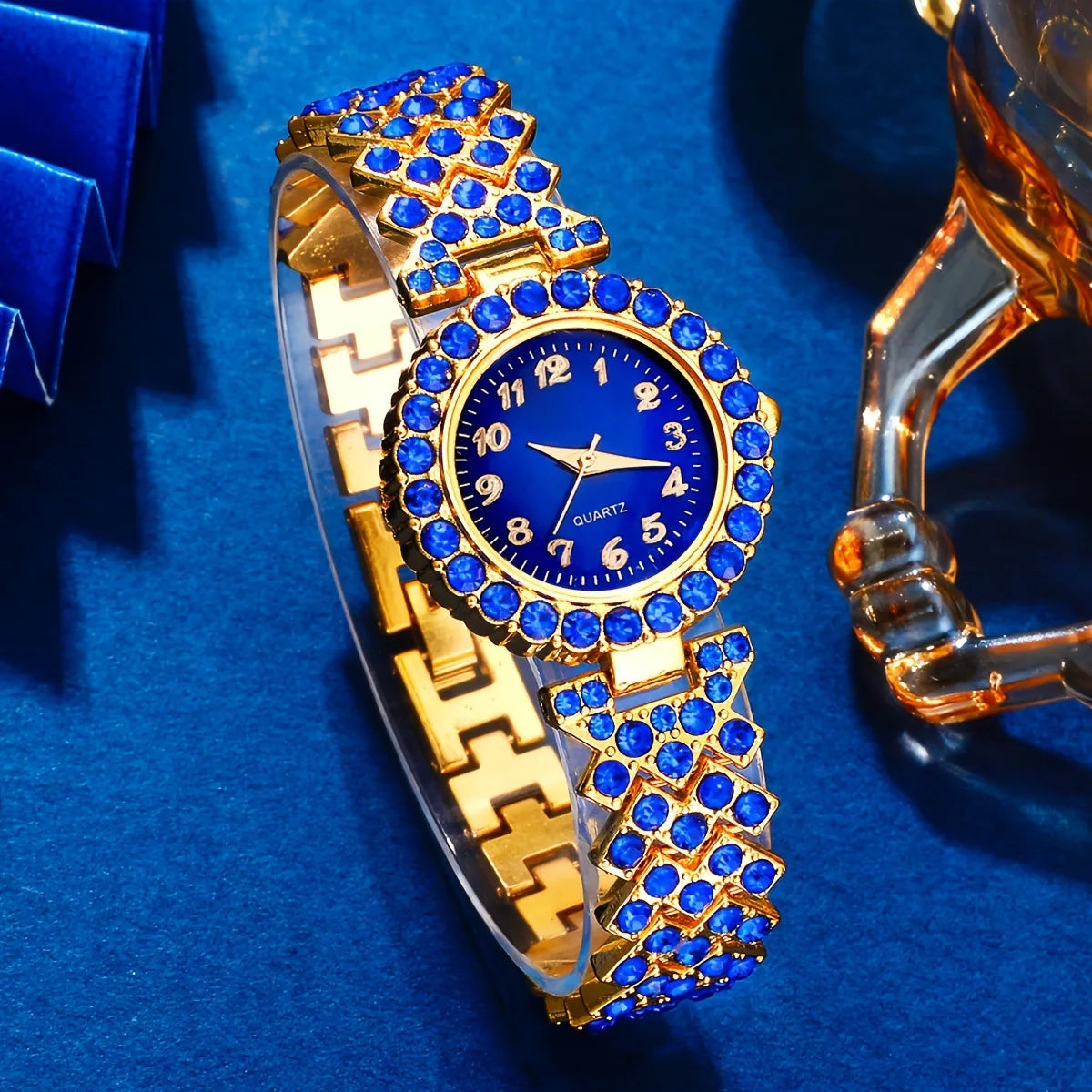 Fashionable women's quartz watch set by MC THE BLACK DIAMOND featuring a stylish wristwatch with a sleek design and elegant details.