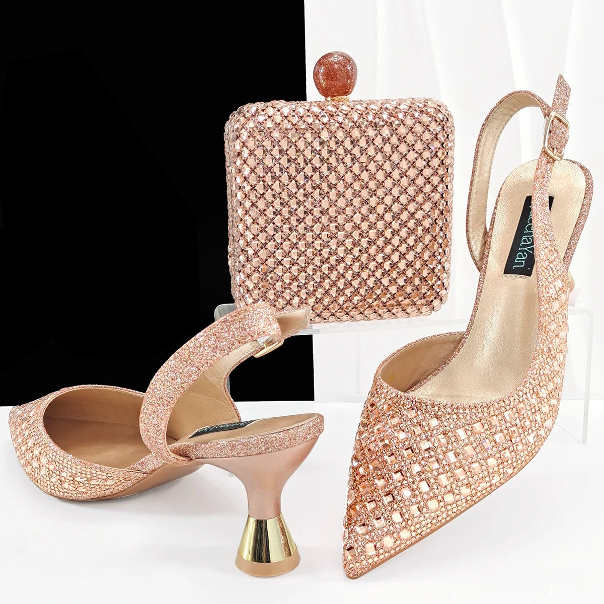 MC THE BLACK DIAMOND heels and matching bag set featuring silver accents, perfect for parties and weddings.