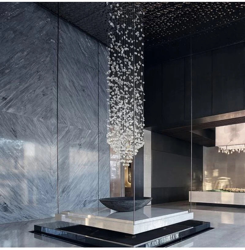 Black Art Luxury Stone Crystal Chandelier by MC THE BLACK DIAMOND hanging in a staircase hallway with LED lights and modern crystal design.
