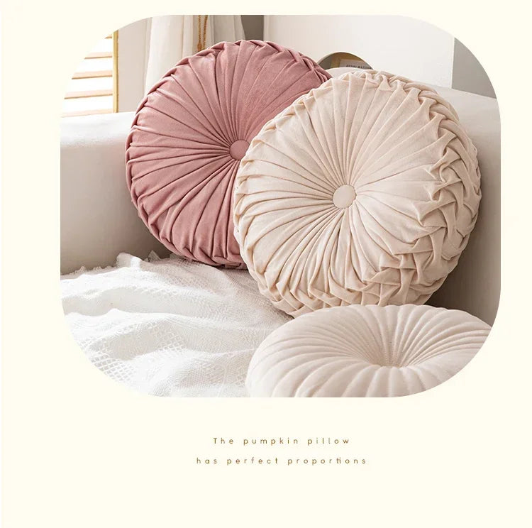 Pink round pumpkin pillow by MC THE BLACK DIAMOND, soft seat cushion and decorative waist pillow for living room or sofa decor.