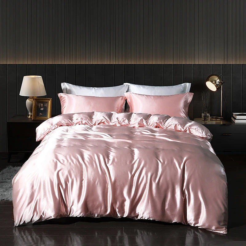 Luxury satin bedding set with fitted sheet and duvet cover by MC THE BLACK DIAMOND, showcasing smooth, elegant home decor.