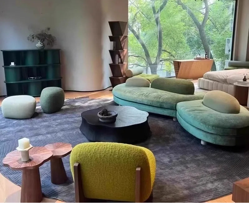 Large green fabric sectional sofa by MC THE BLACK DIAMOND featuring a French pebble design and special-shaped modular love seat.