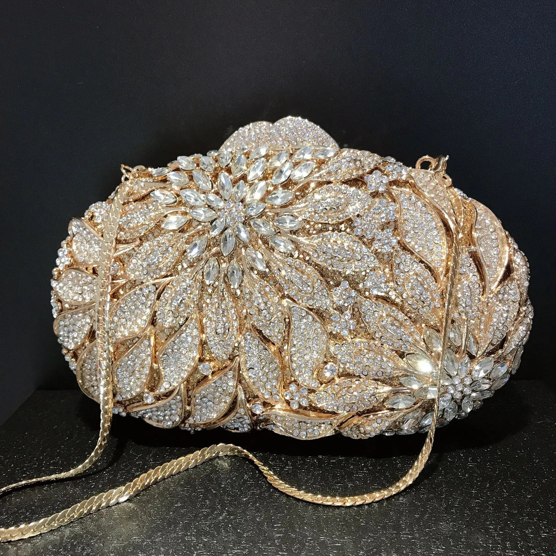 Gold metal leaf evening clutch bag with white crystals, luxury mini heart handbag by MC THE BLACK DIAMOND, perfect for wedding and party.